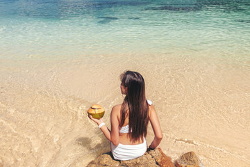 Asian women relaxing in summer holiday on beach