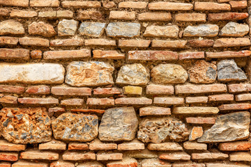 The texture of the stone wall, closeup. Background. Space for text.