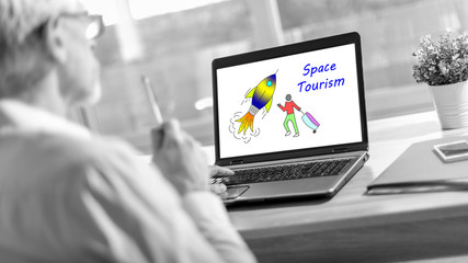 Space tourism concept on a laptop screen