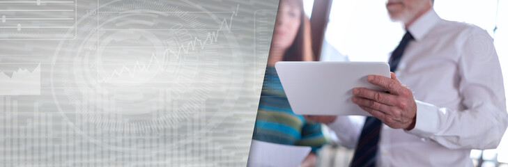 Manager working with executive assistant; panoramic banner