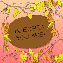 Text sign showing Blessed You Are. Conceptual photo Spiritual gratitude believe in a greater power to have faith Tree Branches Scattered with Leaves Surrounding Blank Color Text Space