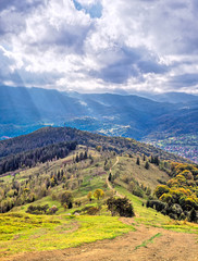 Sun rays over the carpathian autumn mountains