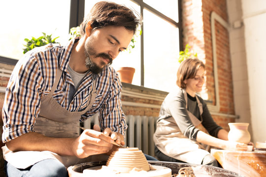 Potters at work - Powered by Adobe