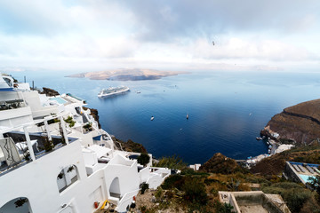 Picturesque view of the city of Santorini. White buildings, sea, mountains. Romantic vacation