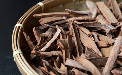Cinnamon sticks in the basket, close up, macro