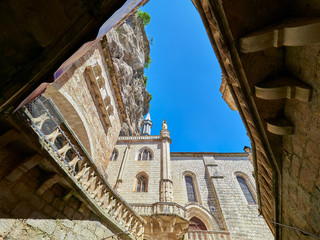 Atrium of Saint Sauveur sanctuary basilica from the staircase that pilgrims climbed on their knees in the medieval french village of Rocamadour, Lot, Quercy, France. UNESCO world heritage site.