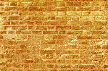 Yellow gold brick wall abstract texture background