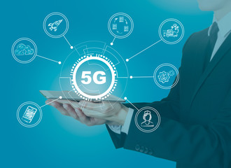 5g network, high-speed mobile Internet. Science, education, business and health concept. Man holding a tablet computer
