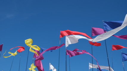 colorful flags fluttering in the wind