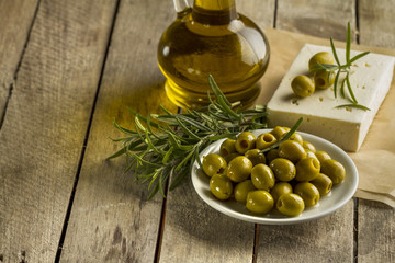 Planks with olives and olive oil