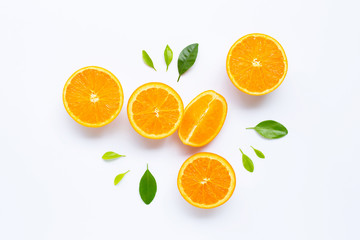 Fresh orange citrus fruit with leaves isolated on white background.