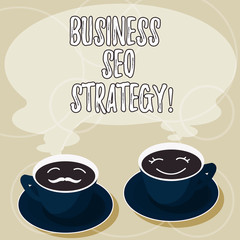 Conceptual hand writing showing Business Seo Strategy. Business photo showcasing Optimization of website to rise the number of visits Cup Saucer for His and Hers Coffee Face icon with Steam