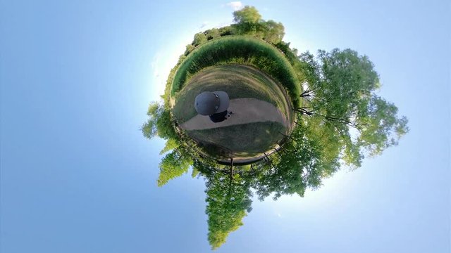 Ansan, South Korea - 07 june 2019 Walk in Ansan Waterside Park. Little Planet View with blue sky and green forest.