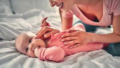 Fototapeta na wymiar Mother with baby girl