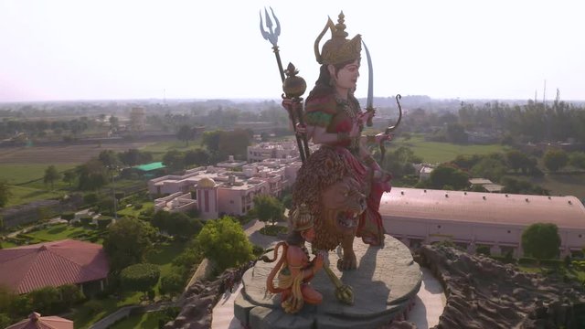Aerial view on Durga temple statue in Vrindavan, India  4k drone view