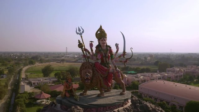 Aerial view on Durga temple statue in Vrindavan, India  4k drone view