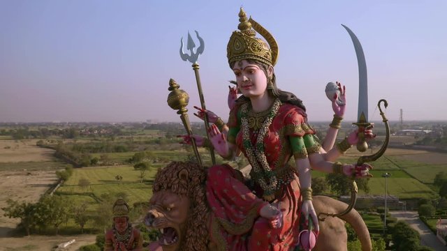 Aerial view on Durga temple statue in Vrindavan, India  4k drone view