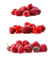 Raspberries and red currants isolated on white background. Red berries closeup. Juicy and delicious raspberries. Background of raspberries. Background of red berries. Various fresh summer fruits.