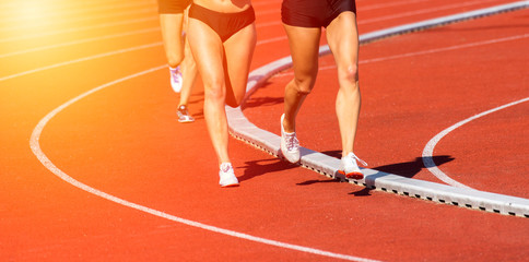 Close up of runners feet  on the track field