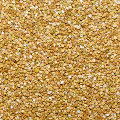 Photo of closeup texture of white buckwheat seeds, background