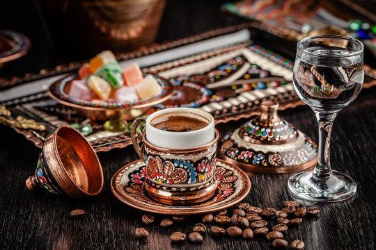 The concept of Turkish cuisine. Turkish brewed black coffee. Beautiful coffee serving in the restaurant. Background image. copy space