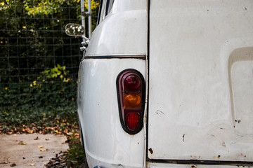 old white car back view