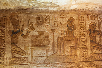 Bas relief of Ramesses II as pharaoh giving offering in the Great Temple of Abu Simbel
