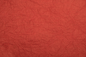 Abstract textured paper terracotta (brown) color background.