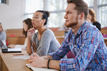 Multinational group of students in an auditorium