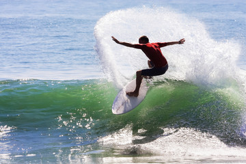 Surfer riding on a wave