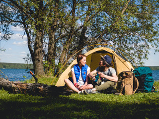 Couple have a rest in tent 