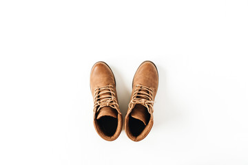Ginger shoes isolated on white background. Flat lay, top view minimal fashion composition.