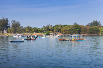 Fototapeta na wymiar Coastal landscape with fishing boats