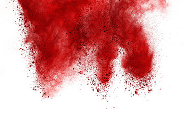 Red powder explosion on white background. Colored cloud. Colorful dust explode. Paint Holi.