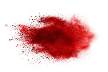 Red powder explosion on white background. Colored cloud. Colorful dust explode. Paint Holi.