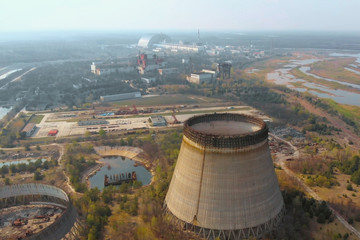 Chernobyl nuclear power plant. Cooling tower overlooking the nuclear power plant in Chernobyl. View...