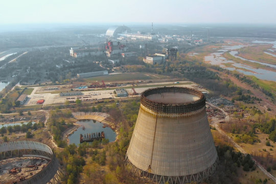 Chernobyl nuclear power plant. Cooling tower overlooking the nuclear power plant in Chernobyl. View of the destroyed nuclear power plant. Chernobyl nuclear power plant, aerial view. Chernobyl NPP