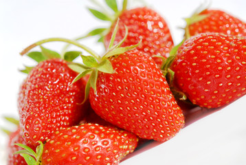 Red berry strawberries on a white background