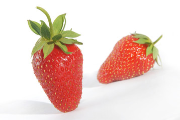 Red berry strawberries on a white background