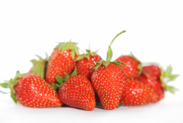 Red berry strawberries on a white background
