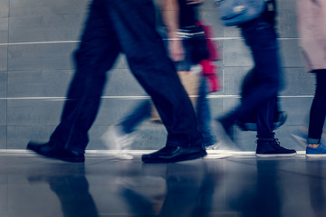 Closeup photo of businessman in black suit going to work