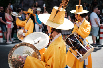 Korean people in traditional costumes performing at Karneval der Kulturen (Carnival of Cultures) in...