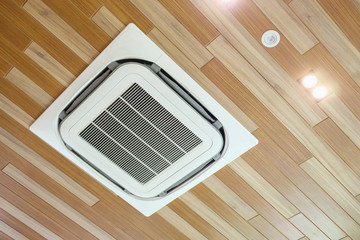 Ceiling air conditioner unit in modern room