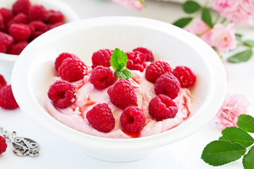 Creamy curd mousse with raspberries. Healthy breakfast.