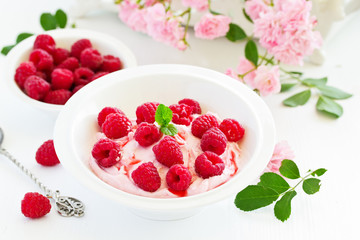 Creamy curd mousse with raspberries. Healthy breakfast.