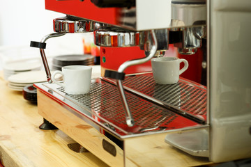 Making coffee in a cafe in the summer. Coffee machine.