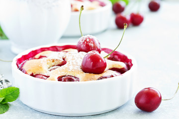 Cherry clafoutis - traditional French sweet fruit dessert.
