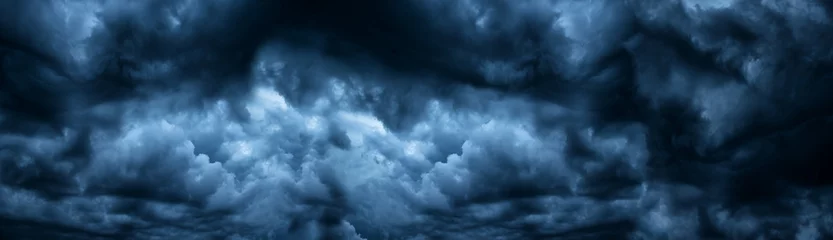 Poster Im Rahmen Dark cloudy sky before thunderstorm panoramic background. Storm heaven panorama. Wide gloomy backdrop © JAYANNPO