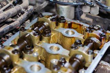 Disassembled internal combustion engine, close-up of the unit head