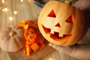 family fun activity - carved pumpkins into jack-o-lanterns for halloween close up 